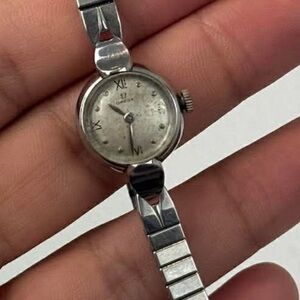 Omega Women's Silver Watch with Roman Numerals